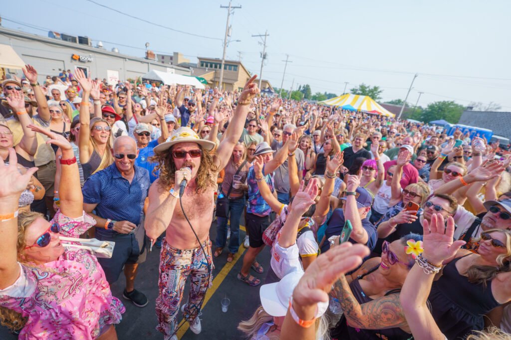 Bombargo performing at Mile of Music Festival - nighttime stage with crowd
